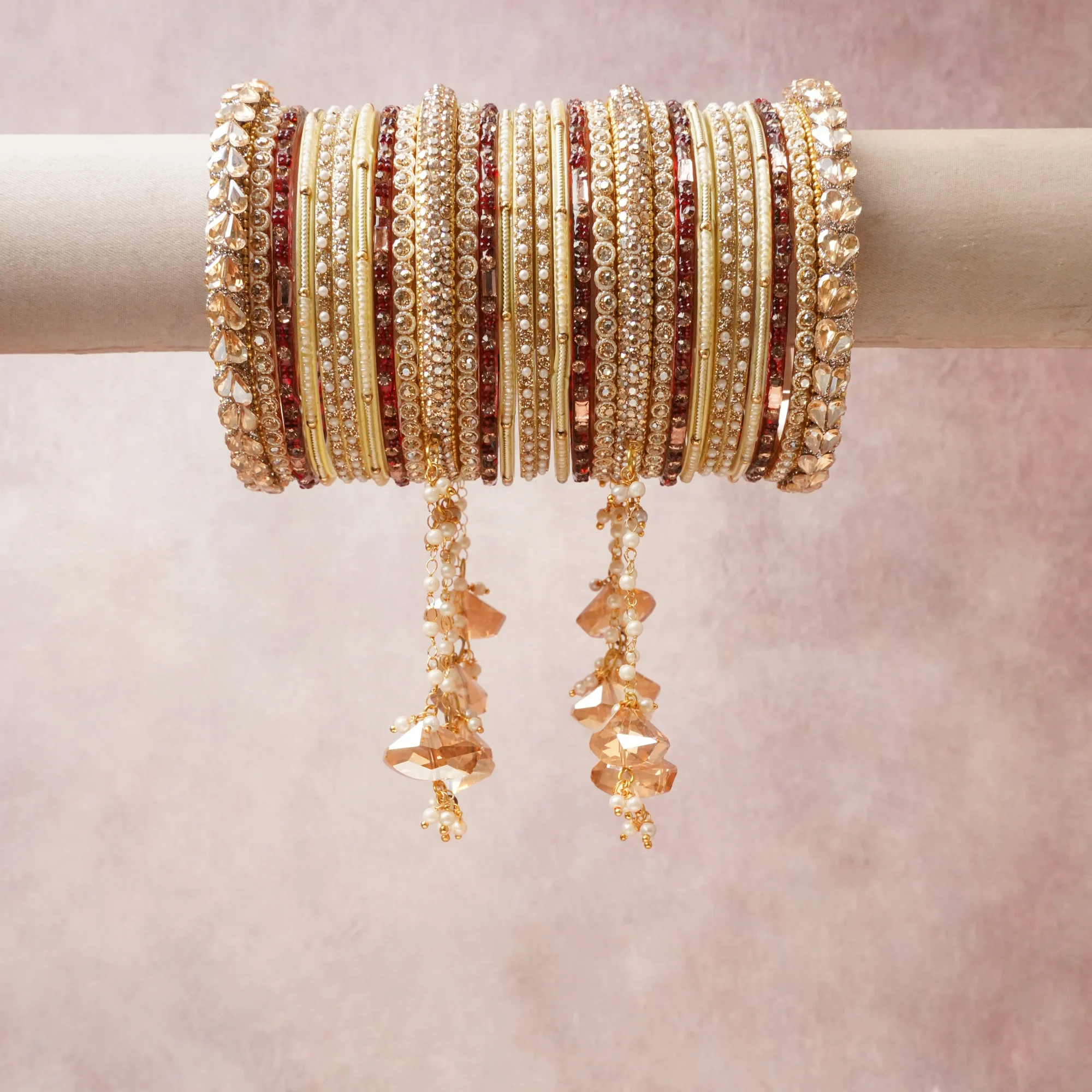 A commanding Gold anchors this beautiful set, enriched with accents of Champagne, Ivory, Burgundy that add depth and dimension.

Featuring a striking composition of Gold-tone metal, rhinestones, pearls, crystal beads, this set carries intricate craftsmanship and strong presence. Grand in form, it is created for moments that deserve to be marked.