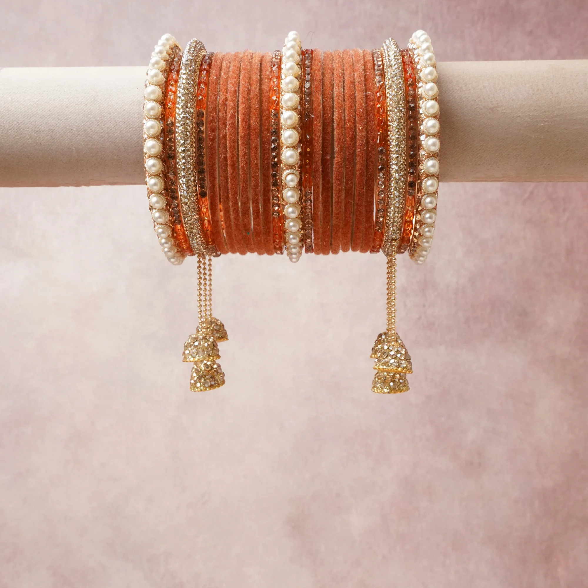 A commanding coral orange anchors this beautiful set, enriched with accents of ivory pearl, gold, champagne that add depth and dimension.

Featuring a striking composition of silk thread, faux pearl, rhinestone, gold-tone metal, this set carries intricate craftsmanship and strong presence. Grand in form, it is created for moments that deserve to be marked.