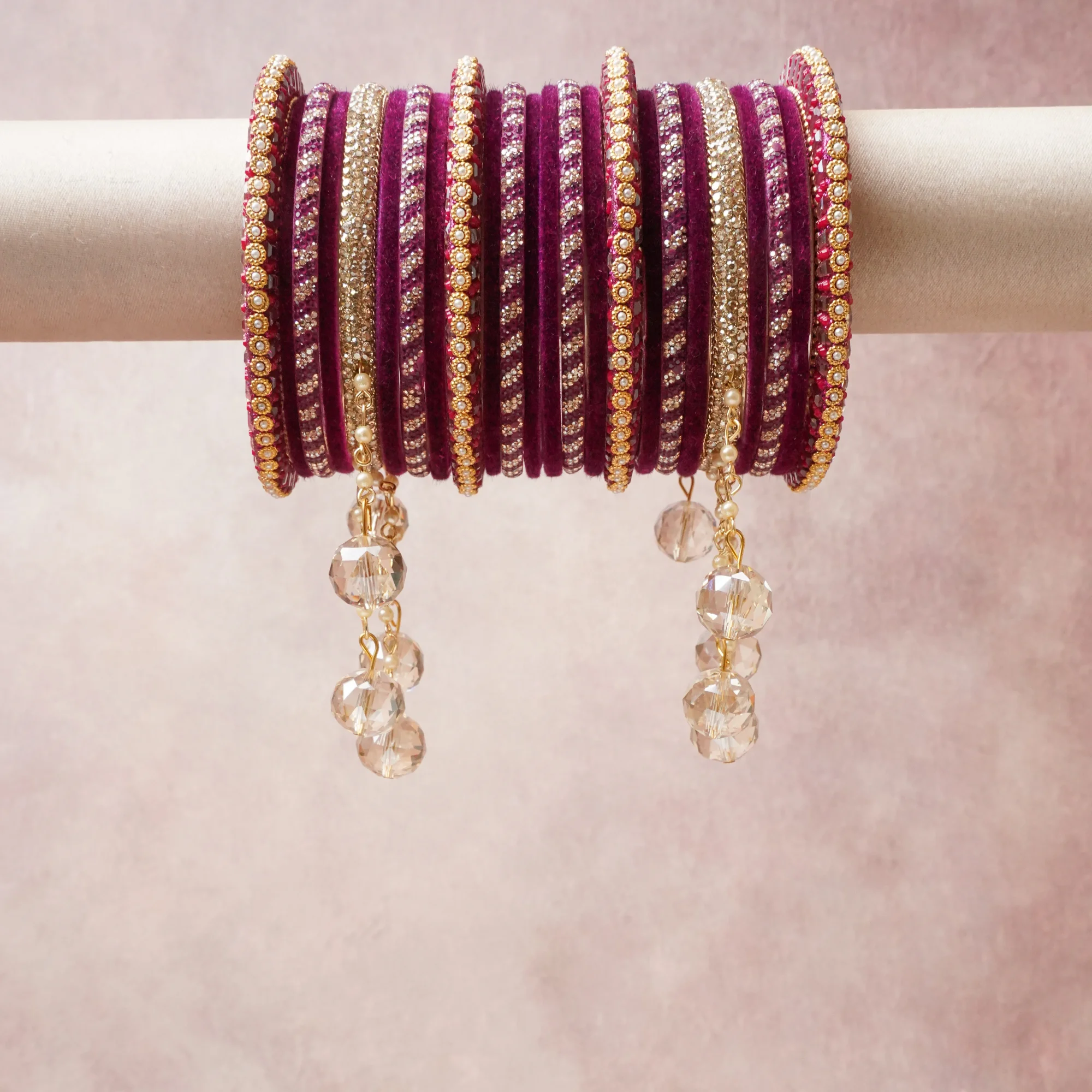A commanding Magenta anchors this beautiful set, enriched with accents of Clear Crystal, Gold, Champagne that add depth and dimension.

Featuring a striking composition of velvet, rhinestones, glass beads, this set carries intricate craftsmanship and strong presence. Grand in form, it is created for moments that deserve to be marked.