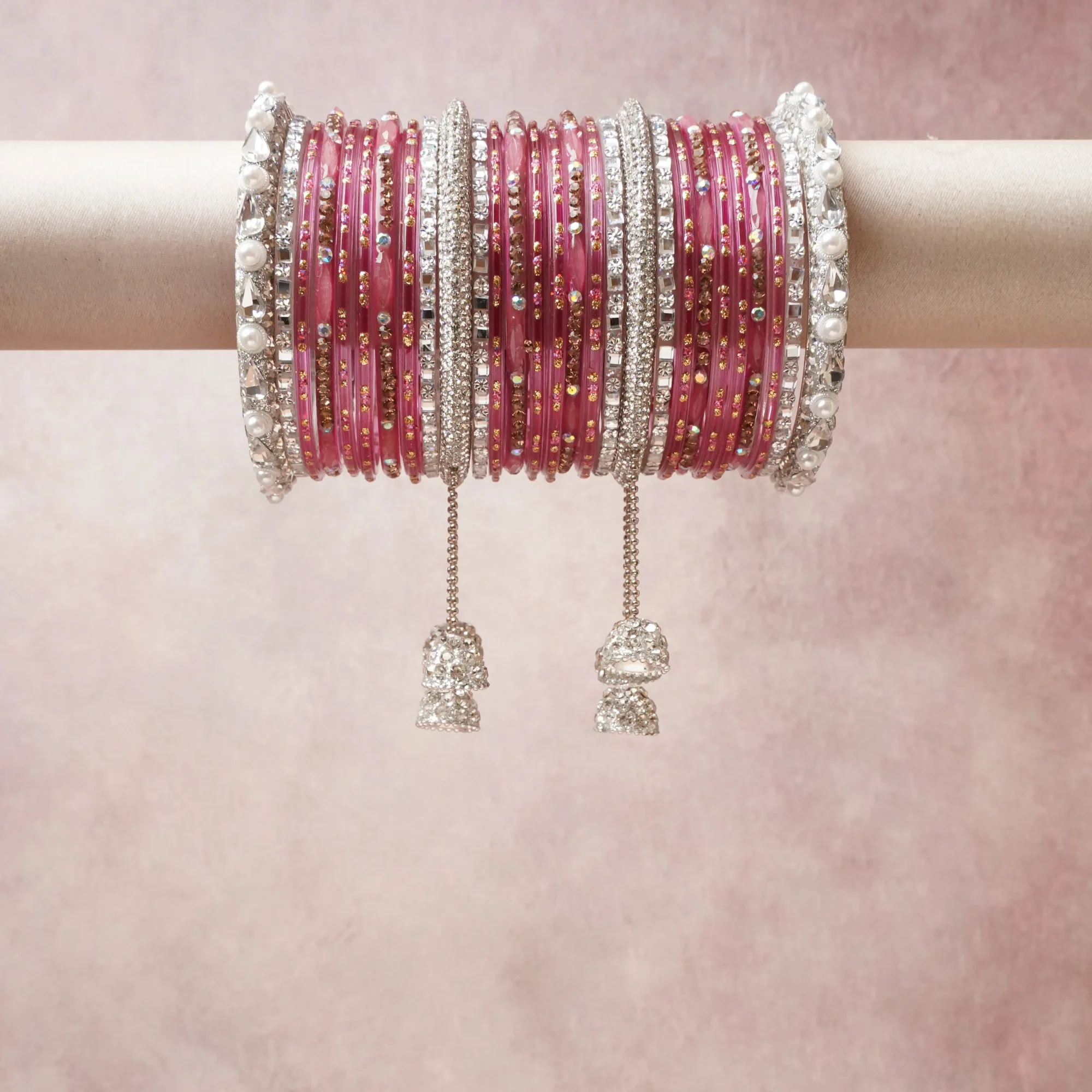 A commanding Fuchsia Pink anchors this beautiful set, enriched with accents of Pearl White, Silver that add depth and dimension.

Featuring a striking composition of Rhinestone, Metal, Pearl Beads, this set carries intricate craftsmanship and strong presence. Grand in form, it is created for moments that deserve to be marked.