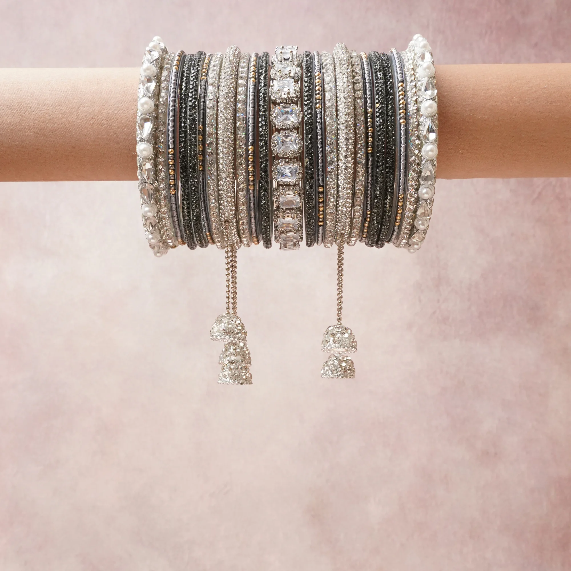 A commanding Silver anchors this beautiful set, enriched with accents of Smoke Grey that add depth and dimension.

Featuring a striking composition of rhinestone, crystal, pearl, this set carries intricate craftsmanship and strong presence. Grand in form, it is created for moments that deserve to be marked.