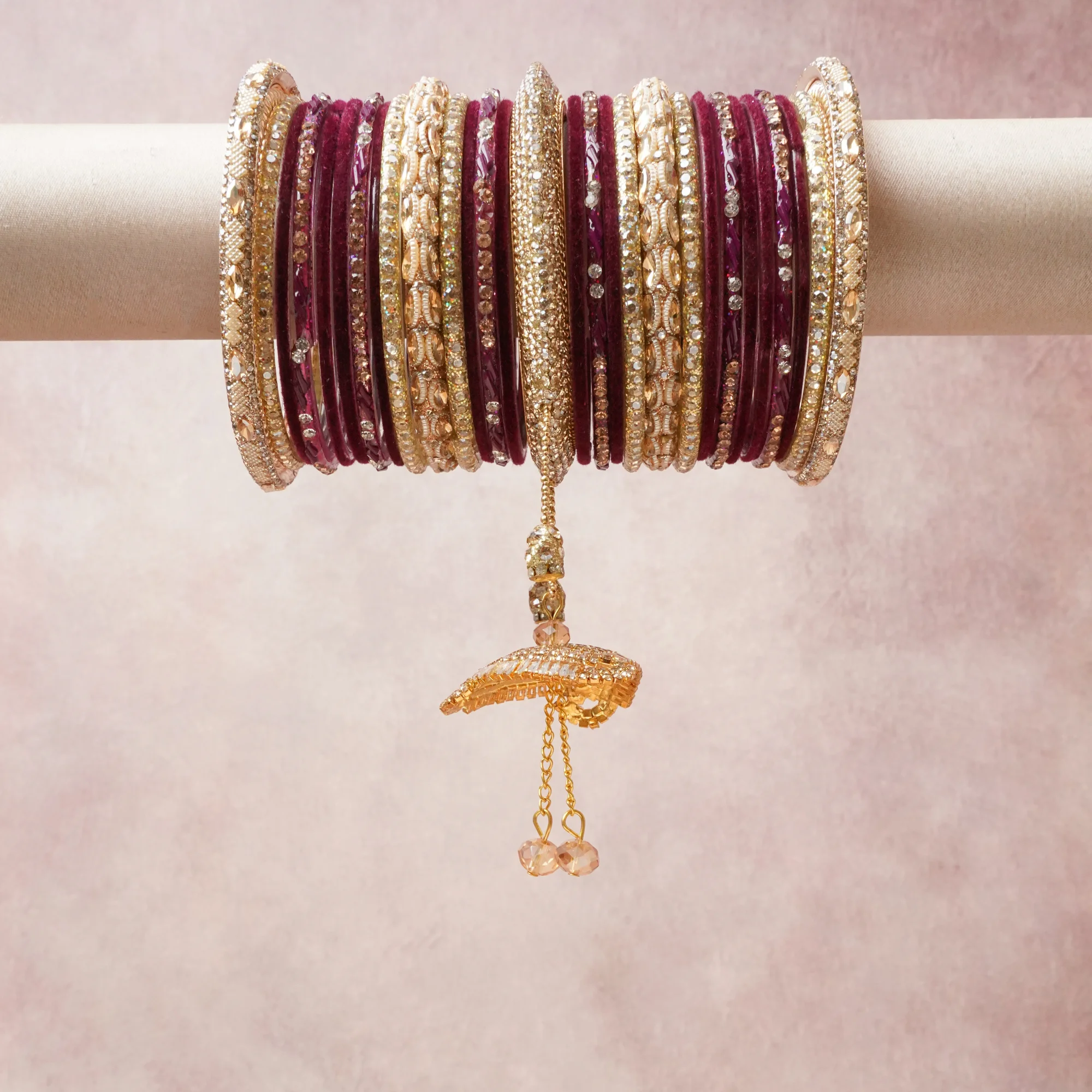 A commanding burgundy anchors this beautiful set, enriched with accents of gold, champagne, clear crystal that add depth and dimension.

Featuring a striking composition of metal, glass, rhinestone, this set carries intricate craftsmanship and strong presence. Grand in form, it is created for moments that deserve to be marked.