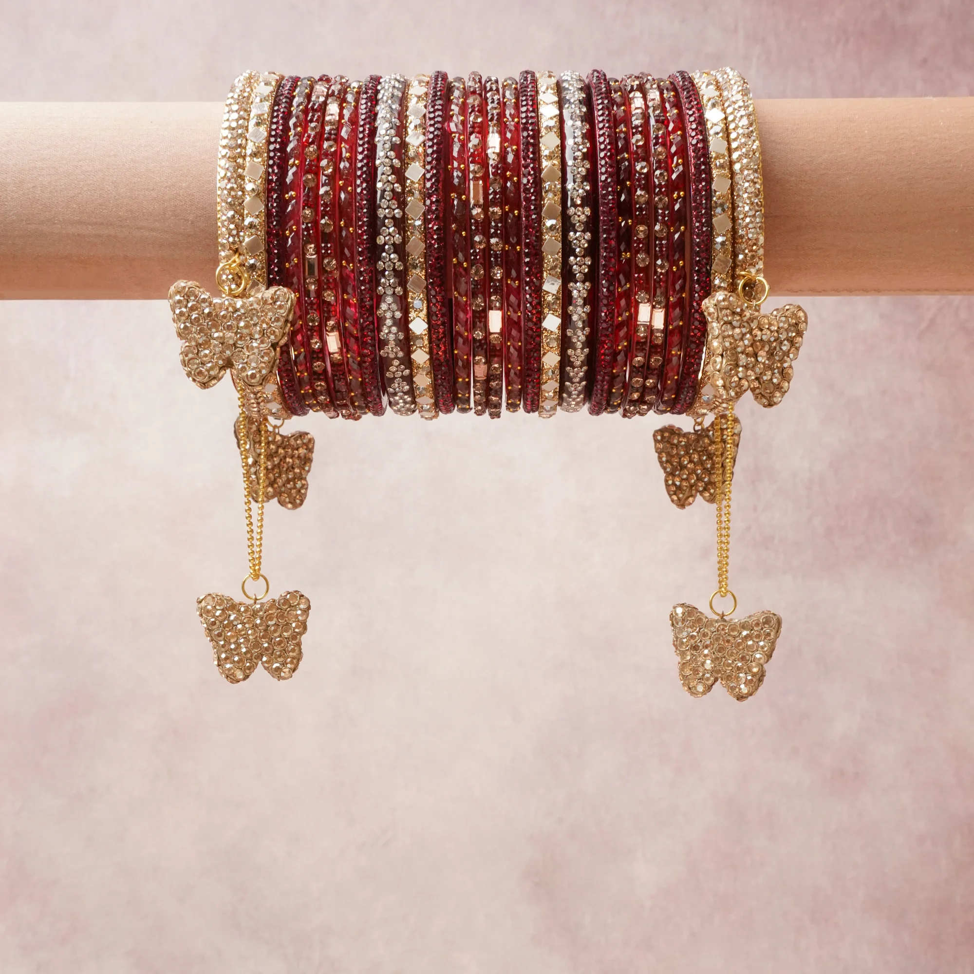 A commanding Deep Burgundy anchors this beautiful set, enriched with accents of Gold, Champagne, Crystal that add depth and dimension.

Featuring a striking composition of Rhinestone-Studded Metal Bangle, this set carries intricate craftsmanship and strong presence. Grand in form, it is created for moments that deserve to be marked.