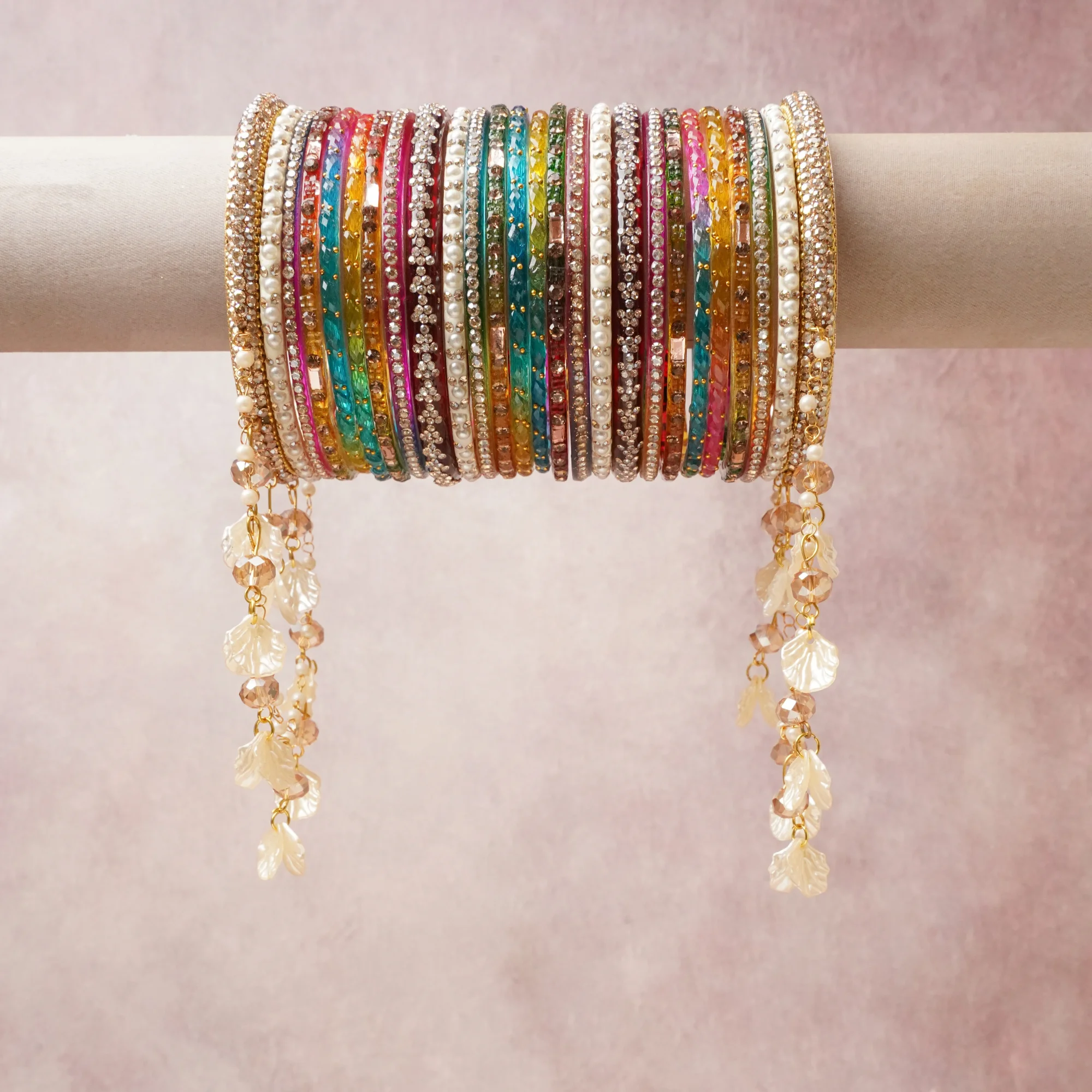 A commanding Multi colour anchors this beautiful set, enriched with accents of Gold, Ivory that add depth and dimension.

Featuring a striking composition of gold-plated metal, crystal stones, pearls, enamel, this set carries intricate craftsmanship and strong presence. Grand in form, it is created for moments that deserve to be marked.