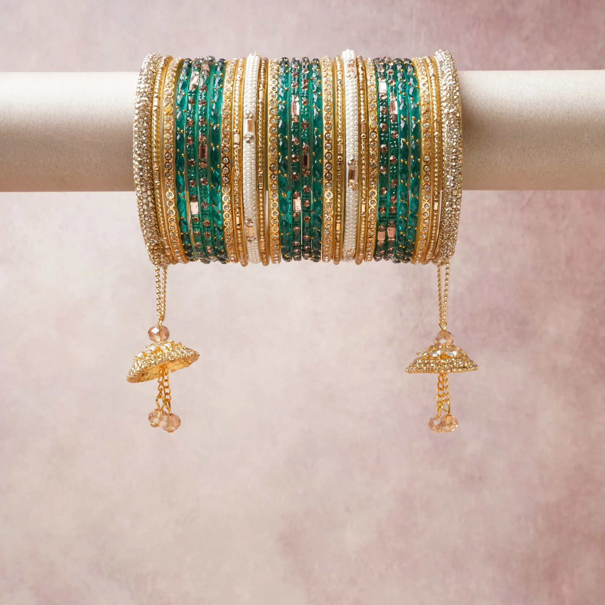 A commanding emerald green anchors this beautiful set, enriched with accents of gold, white, champagne that add depth and dimension.

Featuring a striking composition of gold-tone metal, rhinestones, beadwork, this set carries intricate craftsmanship and strong presence. Grand in form, it is created for moments that deserve to be marked.
