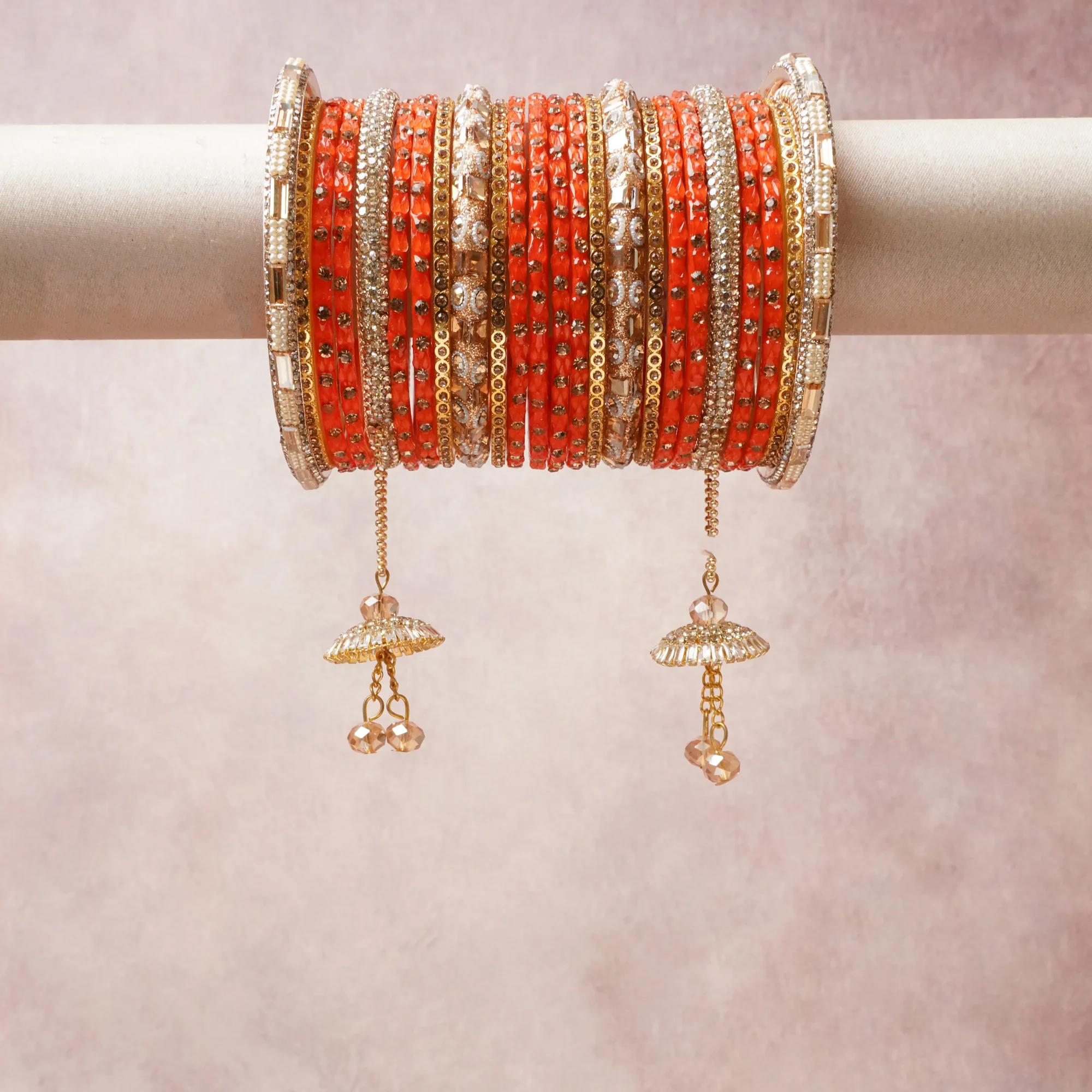 A commanding Orange anchors this beautiful set, enriched with accents of Gold, Ivory that add depth and dimension.

Featuring a striking composition of glass beads, metal alloy, rhinestones, this set carries intricate craftsmanship and strong presence. Grand in form, it is created for moments that deserve to be marked.