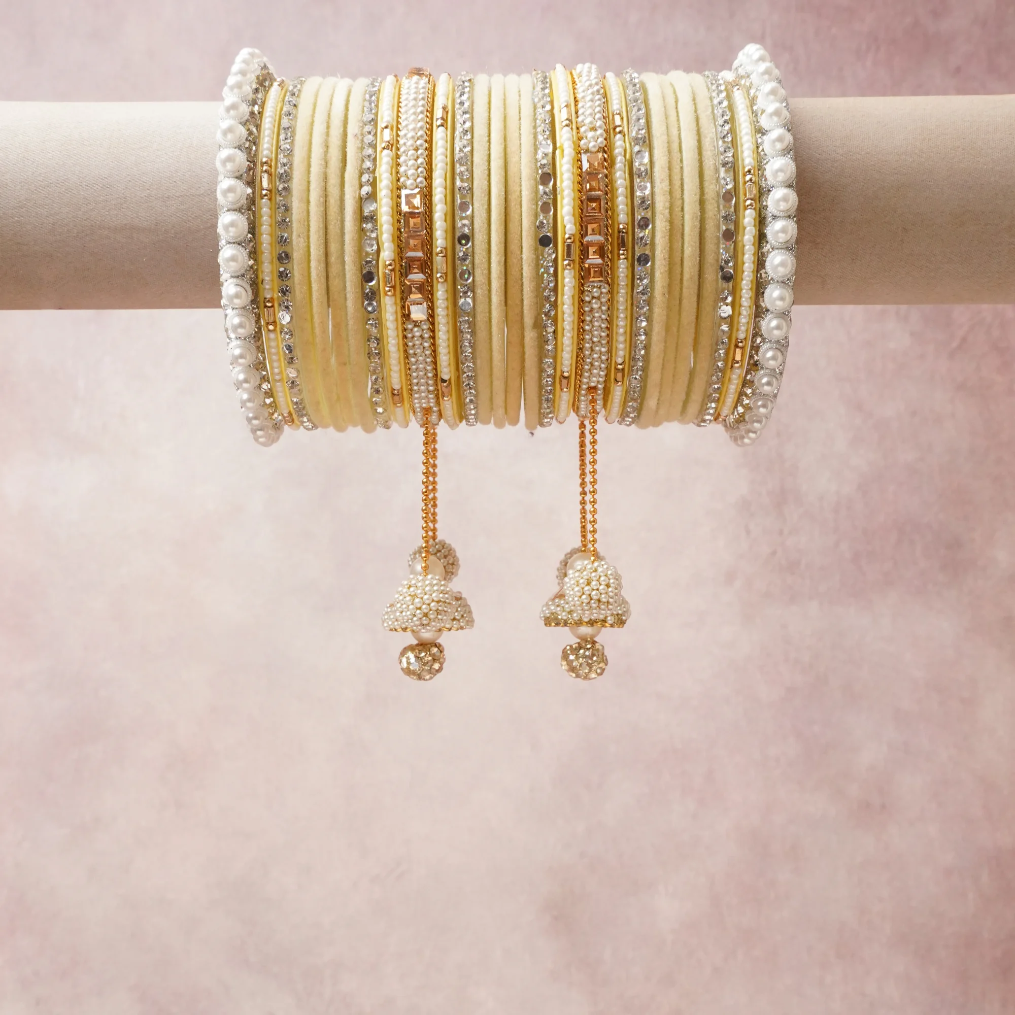 A commanding Pastel Yellow anchors this beautiful set, enriched with accents of Pearl White, Gold, Champagne that add depth and dimension.

Featuring a striking composition of pearls, gold-tone metal, rhinestones, this set carries intricate craftsmanship and strong presence. Grand in form, it is created for moments that deserve to be marked.
