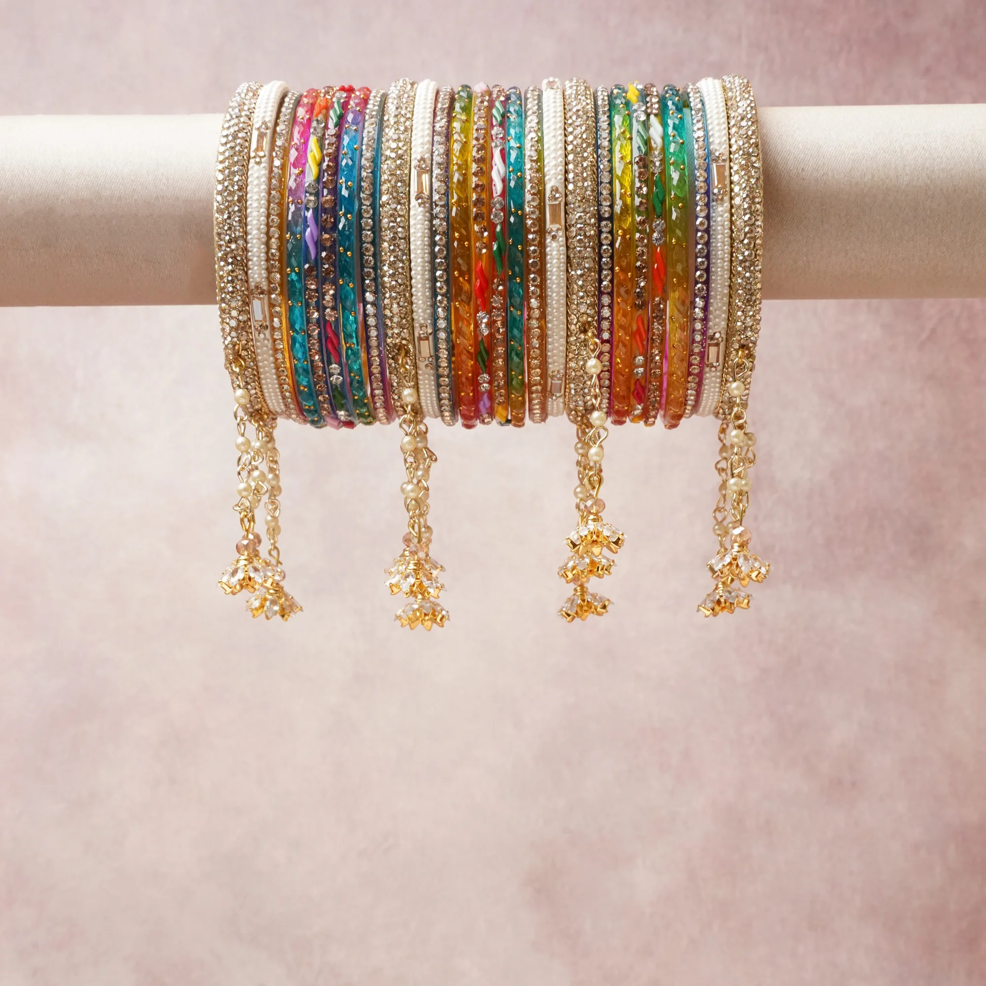 A commanding Multi colour anchors this beautiful set, enriched with accents of Gold, Champagne that add depth and dimension.

Featuring a striking composition of Gold-tone metal, rhinestones, enamel, beads, this set carries intricate craftsmanship and strong presence. Grand in form, it is created for moments that deserve to be marked.