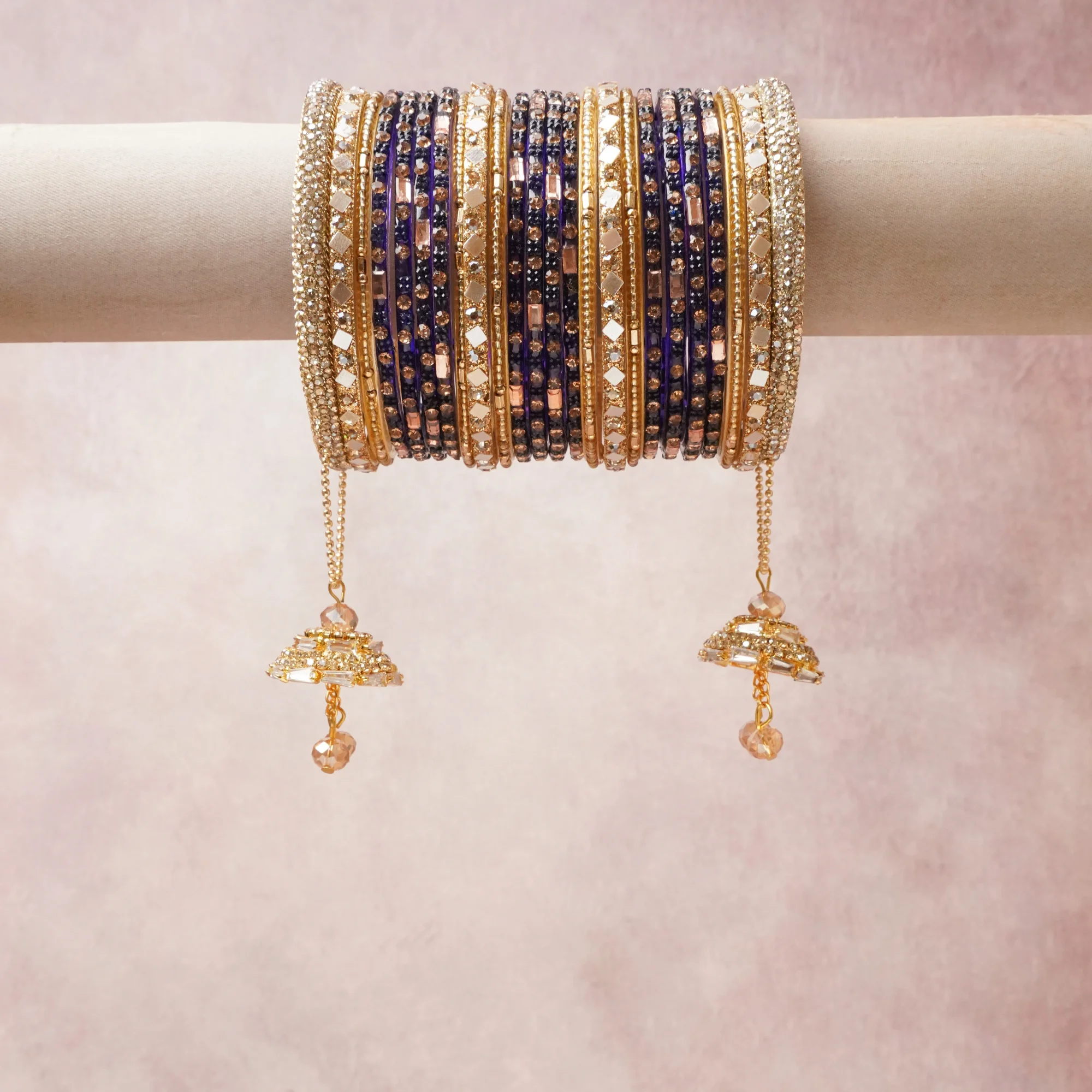 A commanding deep violet anchors this beautiful set, enriched with accents of Champagne, Gold that add depth and dimension.

Featuring a striking composition of gold-tone metal, rhinestone, crystal beads, this set carries intricate craftsmanship and strong presence. Grand in form, it is created for moments that deserve to be marked.