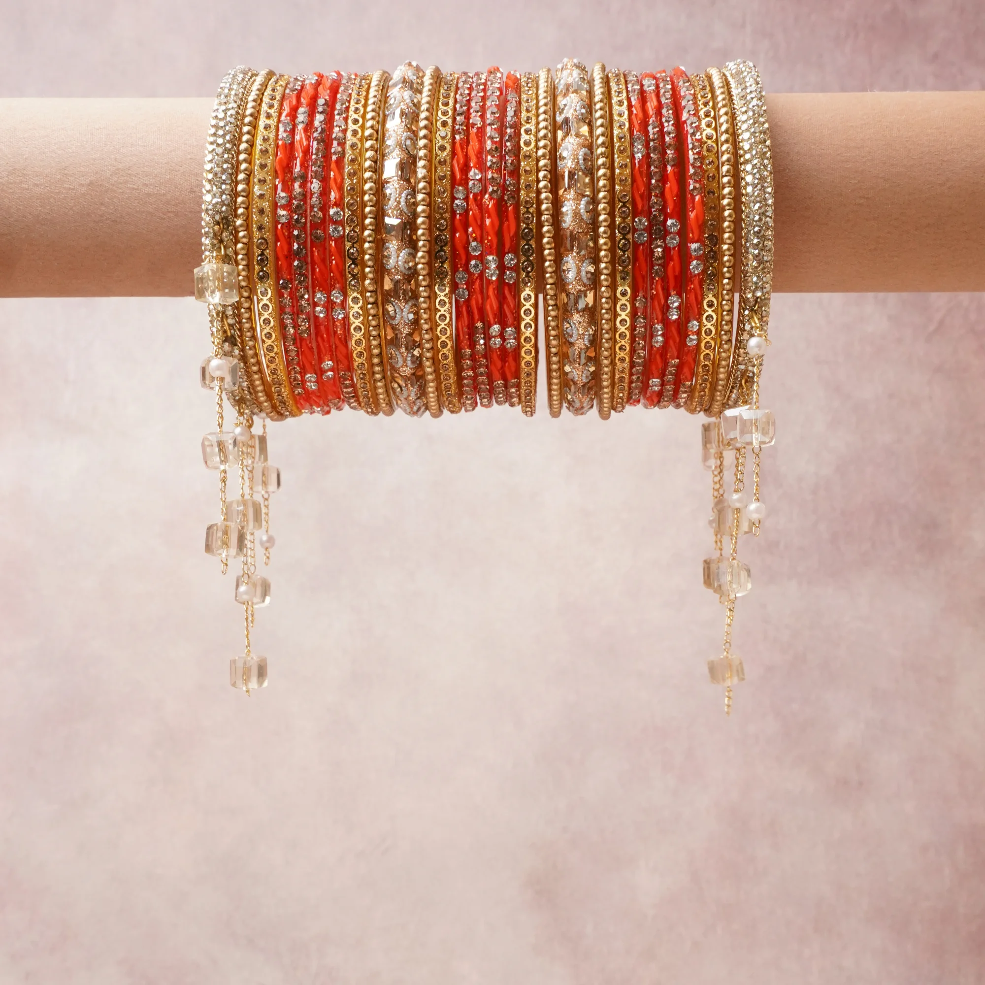 A commanding Coral Red anchors this beautiful set, enriched with accents of Gold that add depth and dimension.

Featuring a striking composition of metal, rhinestone, acrylic beads, this set carries intricate craftsmanship and strong presence. Grand in form, it is created for moments that deserve to be marked.