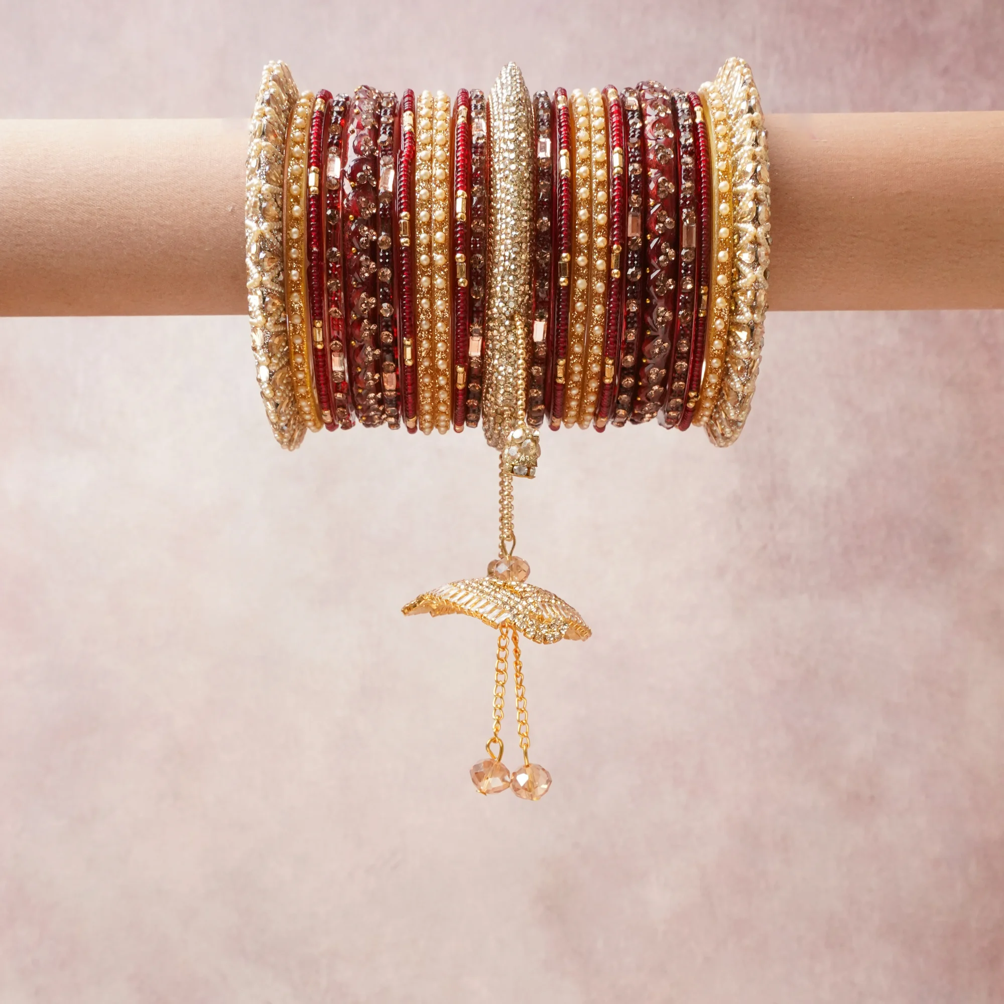 A commanding Deep Red anchors this beautiful set, enriched with accents of Champagne, Gold that add depth and dimension.

Featuring a striking composition of gold-tone metal, rhinestone, pearl, this set carries intricate craftsmanship and strong presence. Grand in form, it is created for moments that deserve to be marked.