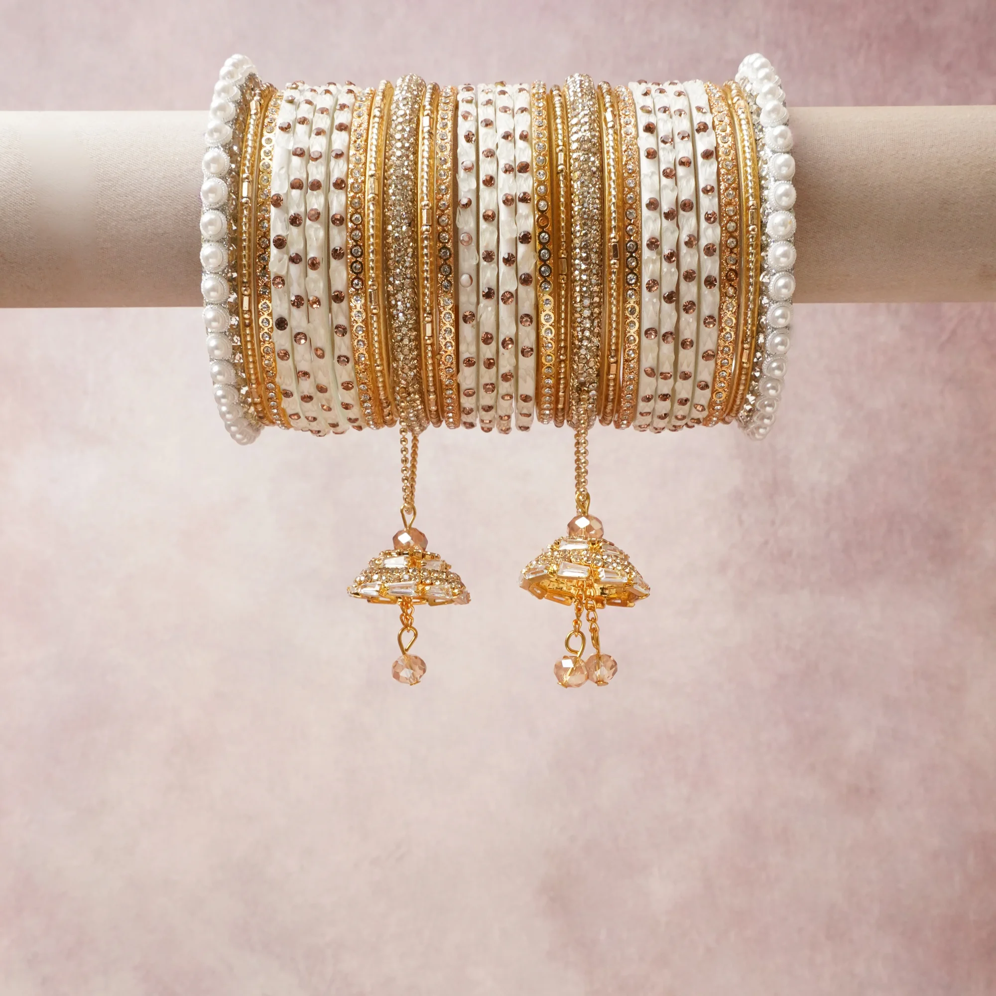 A commanding Ivory anchors this beautiful set, enriched with accents of Gold, White that add depth and dimension.

Featuring a striking composition of glass beads, metal, pearl beads, this set carries intricate craftsmanship and strong presence. Grand in form, it is created for moments that deserve to be marked.