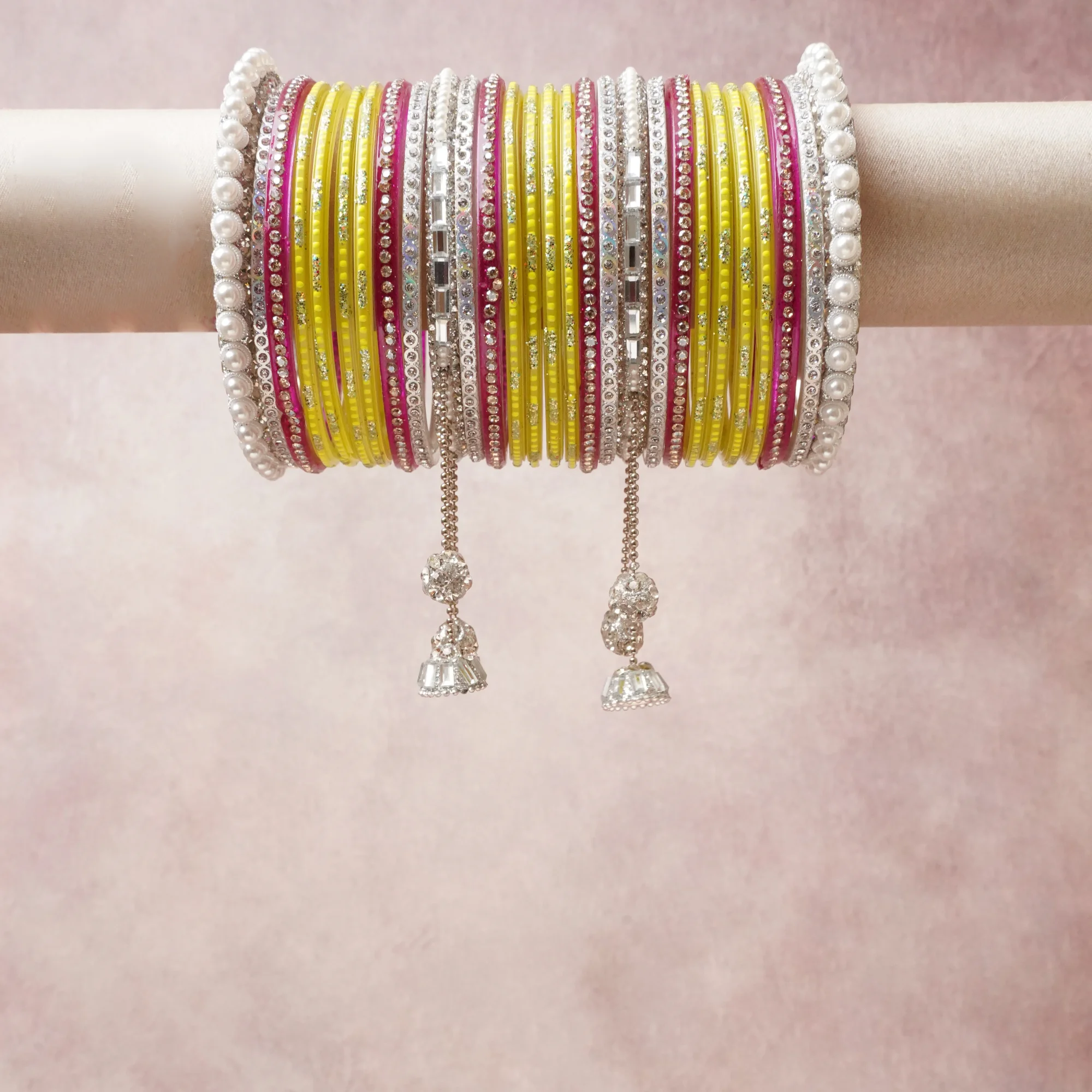 A commanding Lime Green anchors this beautiful set, enriched with accents of Hot Pink, Silver, White that add depth and dimension.

Featuring a striking composition of glass bangles, rhinestone, pearl, this set carries intricate craftsmanship and strong presence. Grand in form, it is created for moments that deserve to be marked.