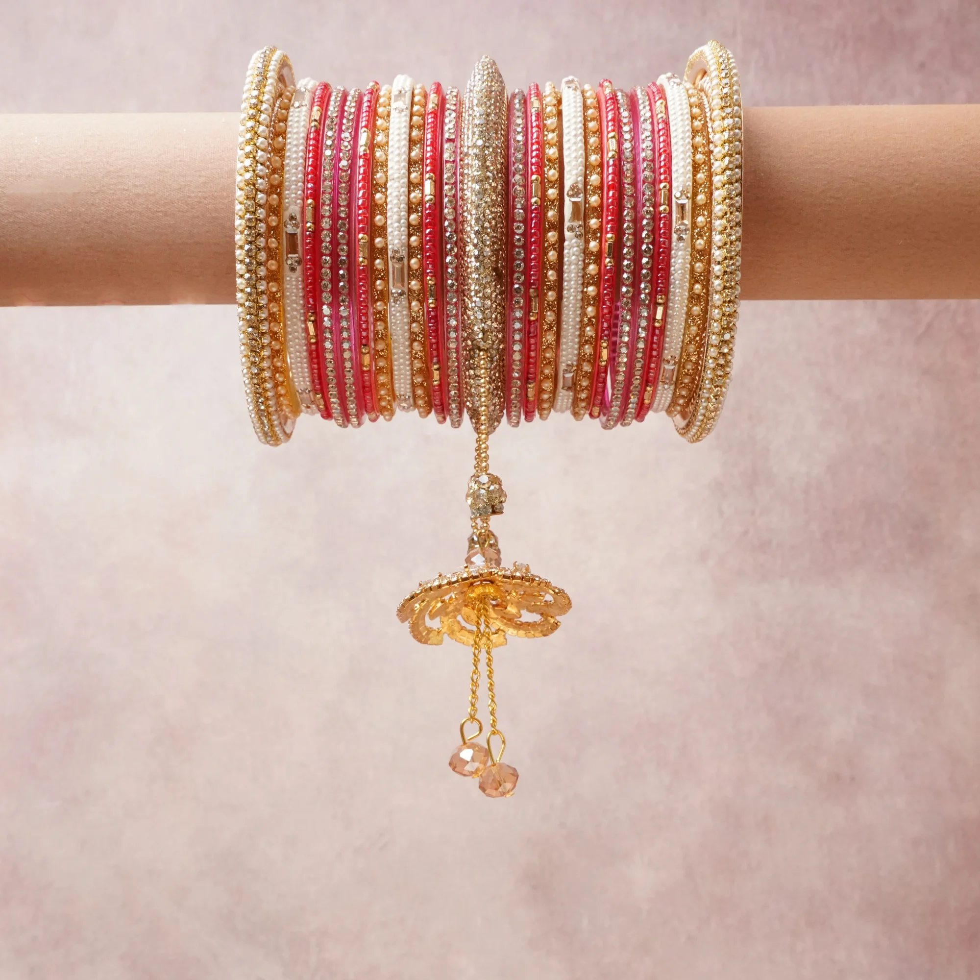 A commanding Red anchors this beautiful set, enriched with accents of Rose Gold, White, Gold that add depth and dimension.

Featuring a striking composition of crystal, beadwork, metal, this set carries intricate craftsmanship and strong presence. Grand in form, it is created for moments that deserve to be marked.