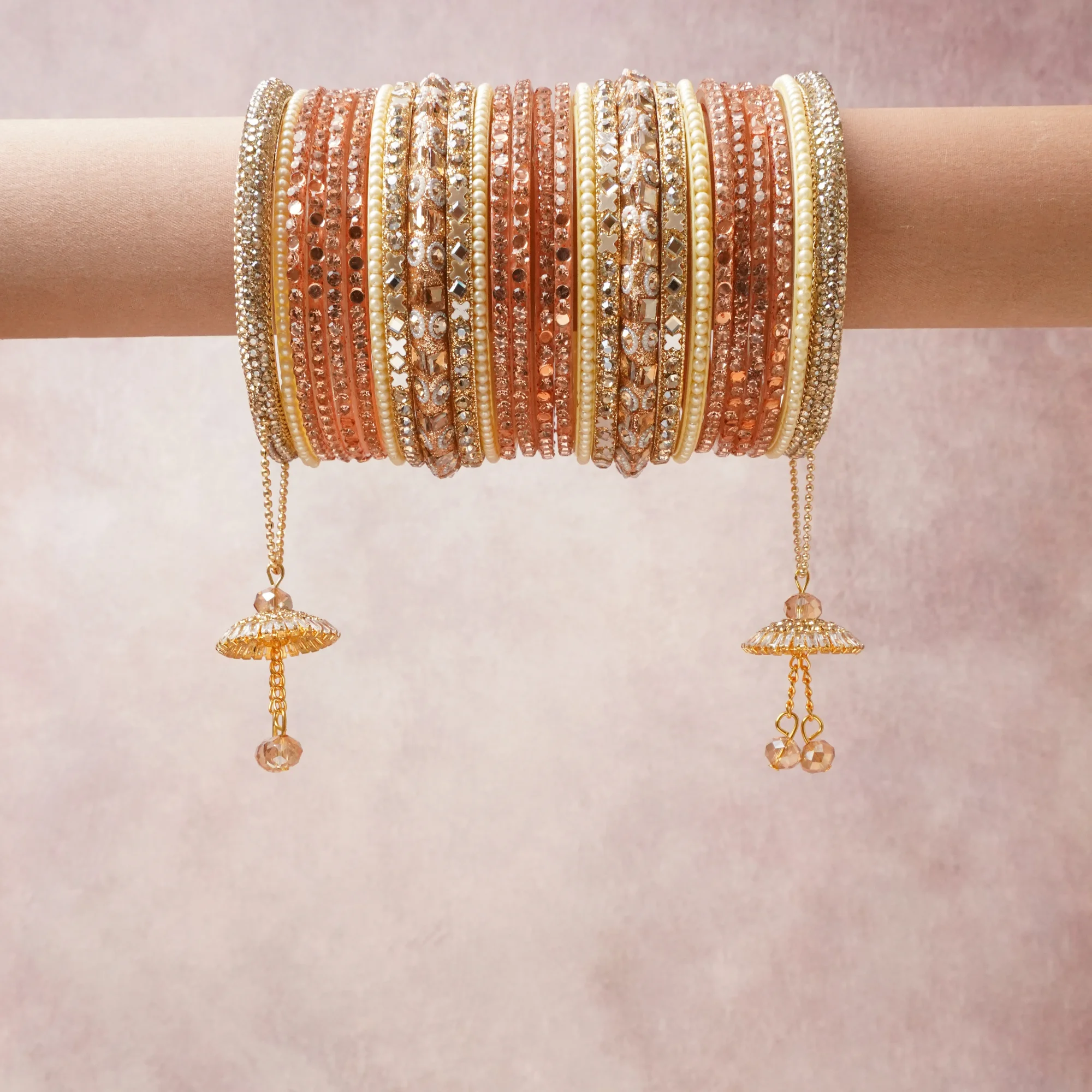 A commanding rose gold anchors this beautiful set, enriched with accents of ivory, champagne, clear crystal that add depth and dimension.

Featuring a striking composition of metal, rhinestone, beads, this set carries intricate craftsmanship and strong presence. Grand in form, it is created for moments that deserve to be marked.