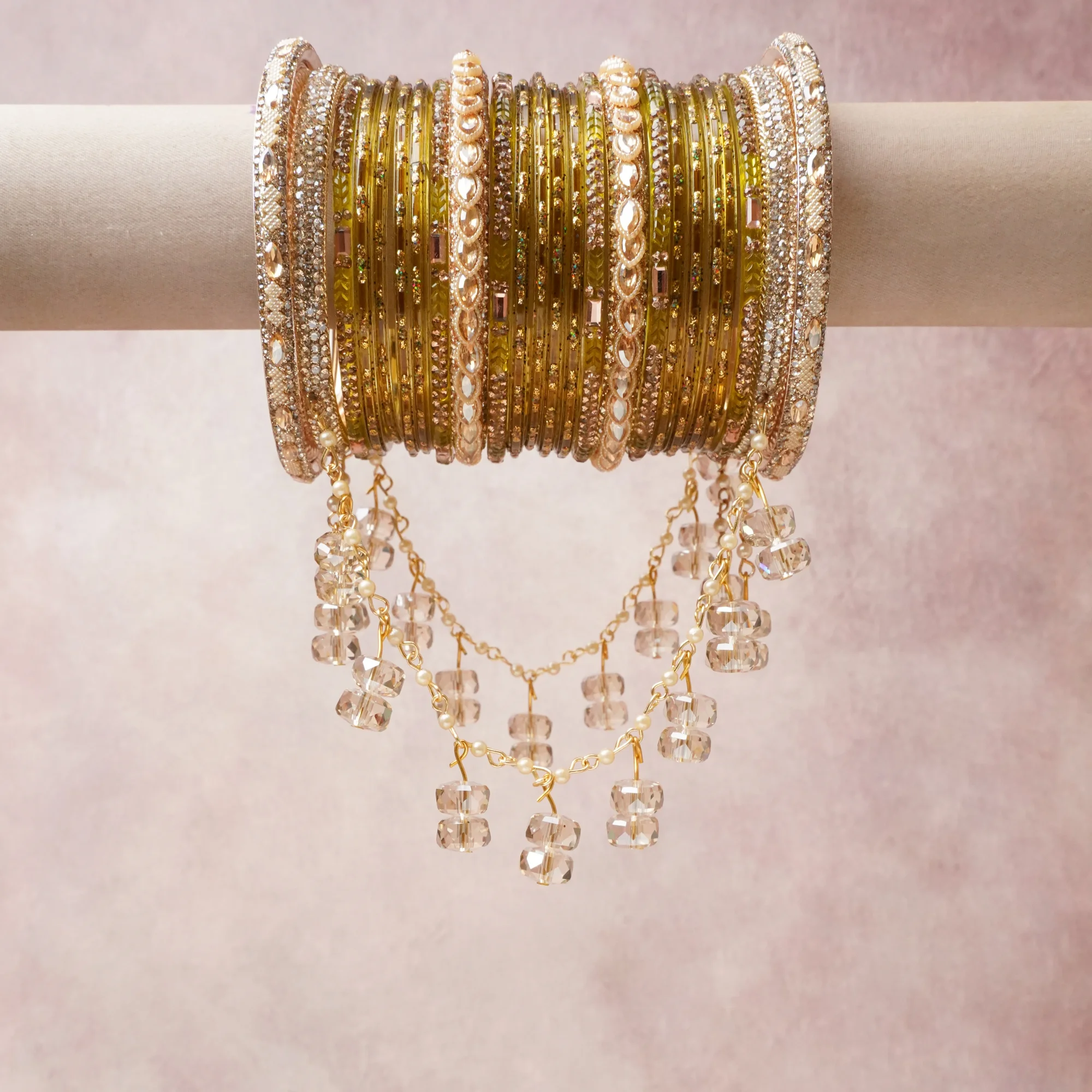 A commanding Olive Green anchors this beautiful set, enriched with accents of Champagne, Gold that add depth and dimension.

Featuring a striking composition of gold-tone metal, rhinestones, crystal beads, this set carries intricate craftsmanship and strong presence. Grand in form, it is created for moments that deserve to be marked.