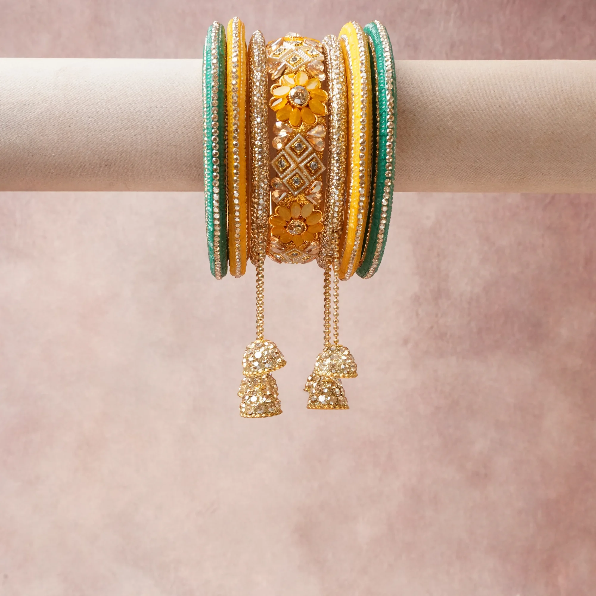 A grounding yellow forms the heart of the set, while touches of Green, Gold add charm.

A thoughtful composition of gold-plated metal, rhinestones, enamel, designed to feel complete without being heavy.
Each element layers seamlessly, creating a look that is refined, wearable and quietly striking.