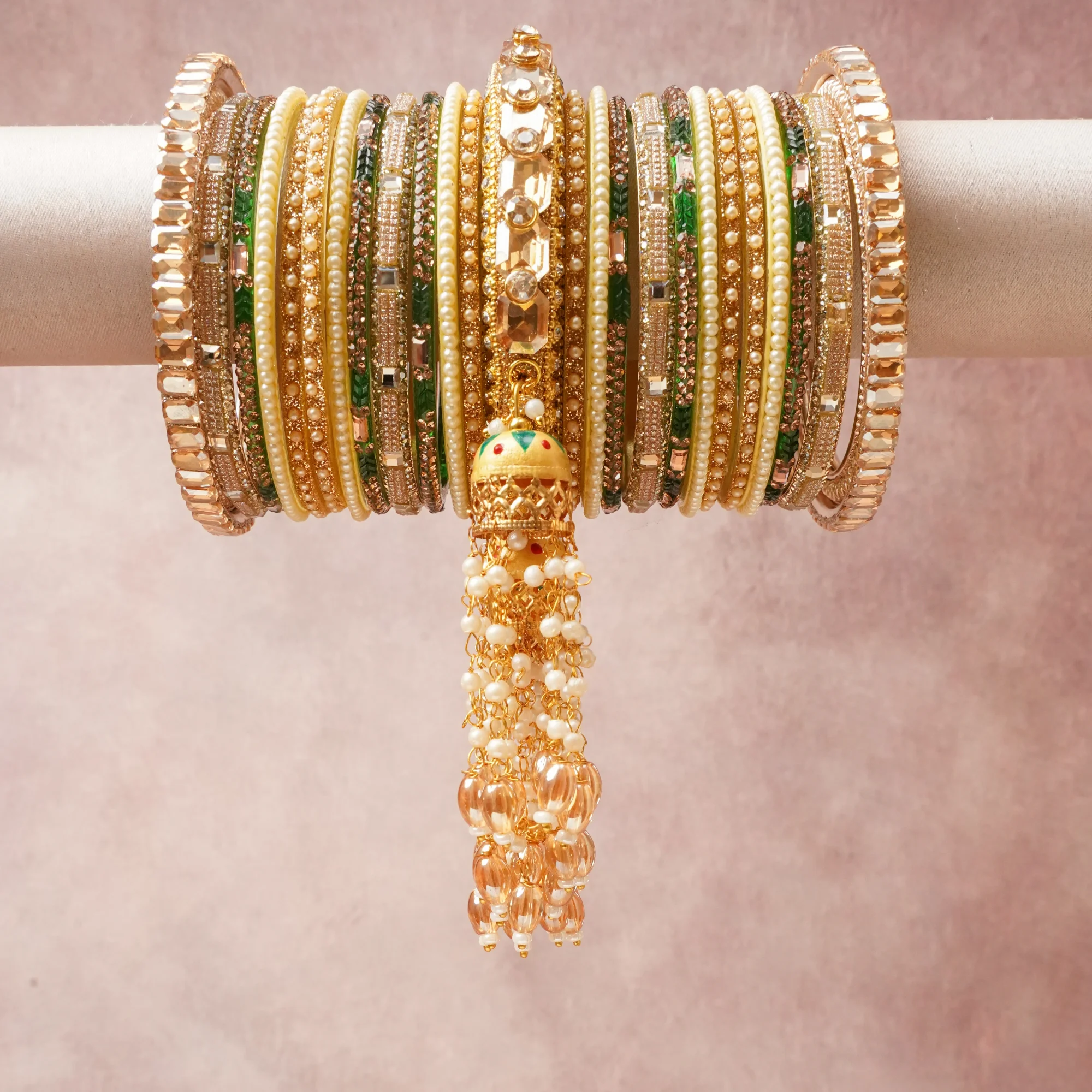 A commanding Gold anchors this beautiful set, enriched with accents of Green, Ivory that add depth and dimension.

Featuring a striking composition of gold-tone metal, rhinestones, faux pearls, this set carries intricate craftsmanship and strong presence. Grand in form, it is created for moments that deserve to be marked.