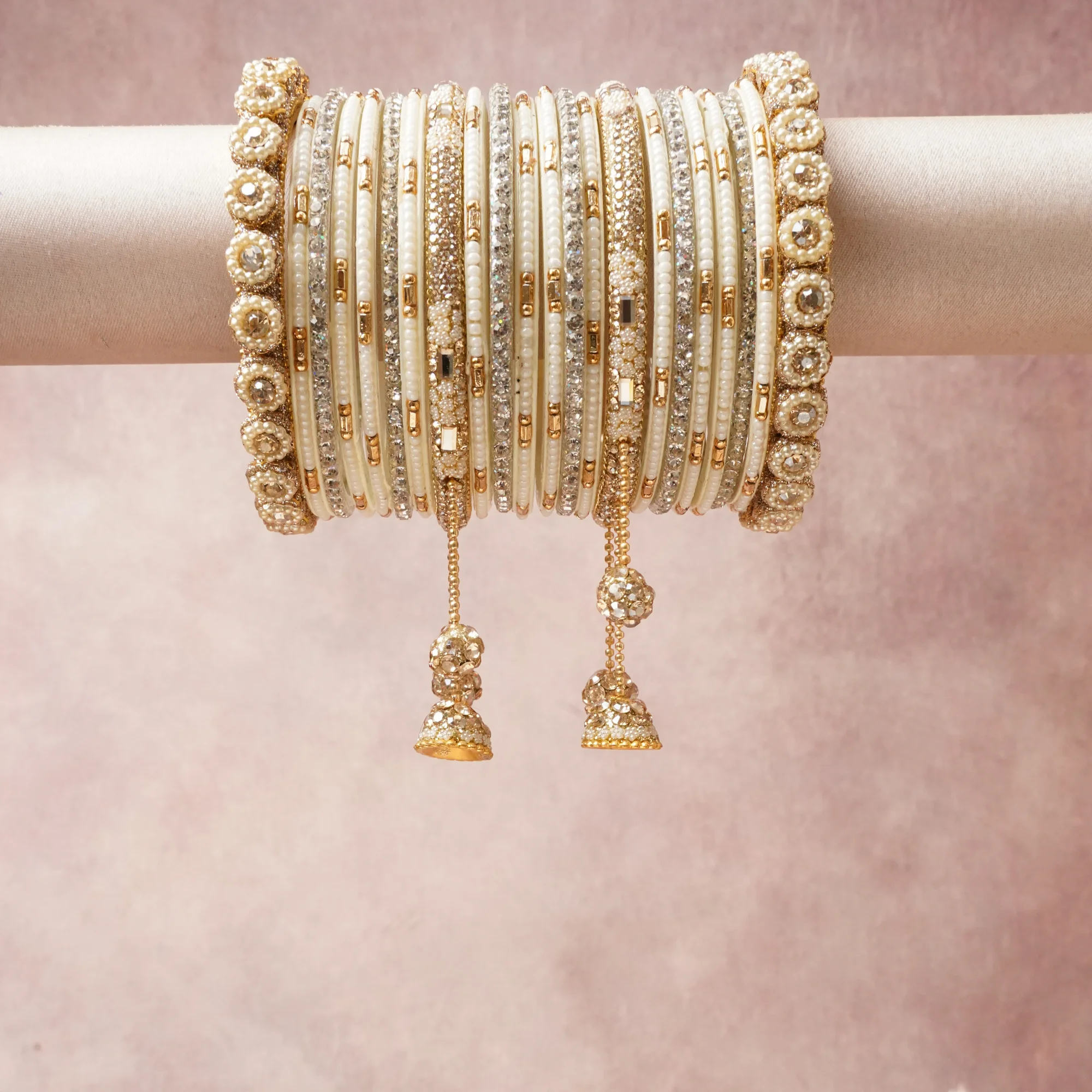 A commanding White anchors this beautiful set, enriched with accents of Champagne, Ivory, Silver that add depth and dimension.

Featuring a striking composition of Gold-plated metal, pearls, rhinestones, this set carries intricate craftsmanship and strong presence. Grand in form, it is created for moments that deserve to be marked.
