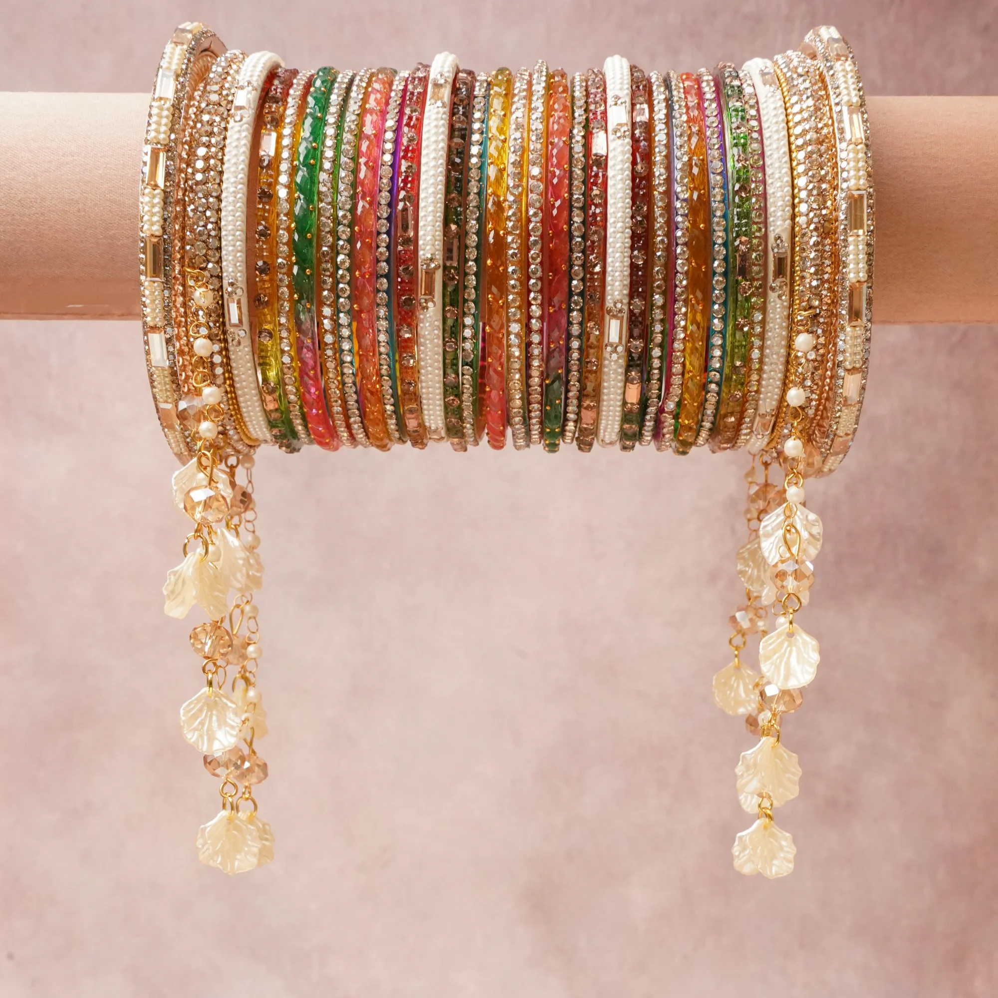 A commanding Multi colour anchors this beautiful set, enriched with accents of White, Gold that add depth and dimension.

Featuring a striking composition of crystal, pearl, metal, this set carries intricate craftsmanship and strong presence. Grand in form, it is created for moments that deserve to be marked.