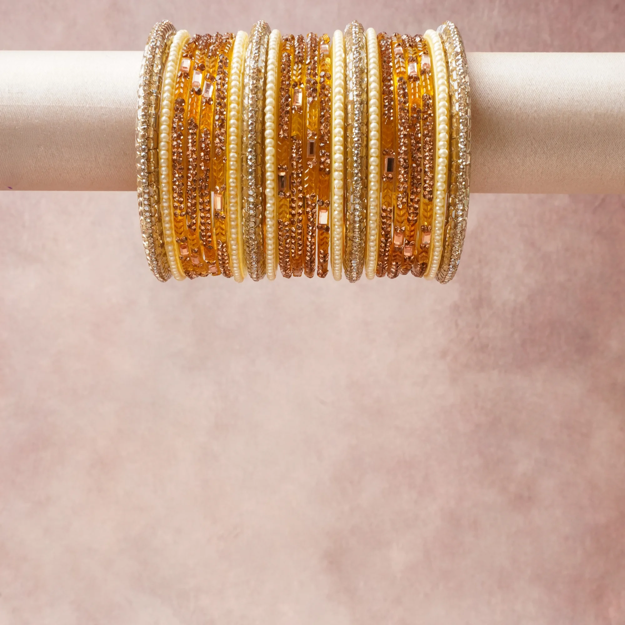 A commanding Gold anchors this beautiful set, enriched with accents of Champagne, Gold that add depth and dimension.

Featuring a striking composition of metal, rhinestone, faux pearl, this set carries intricate craftsmanship and strong presence. Grand in form, it is created for moments that deserve to be marked.