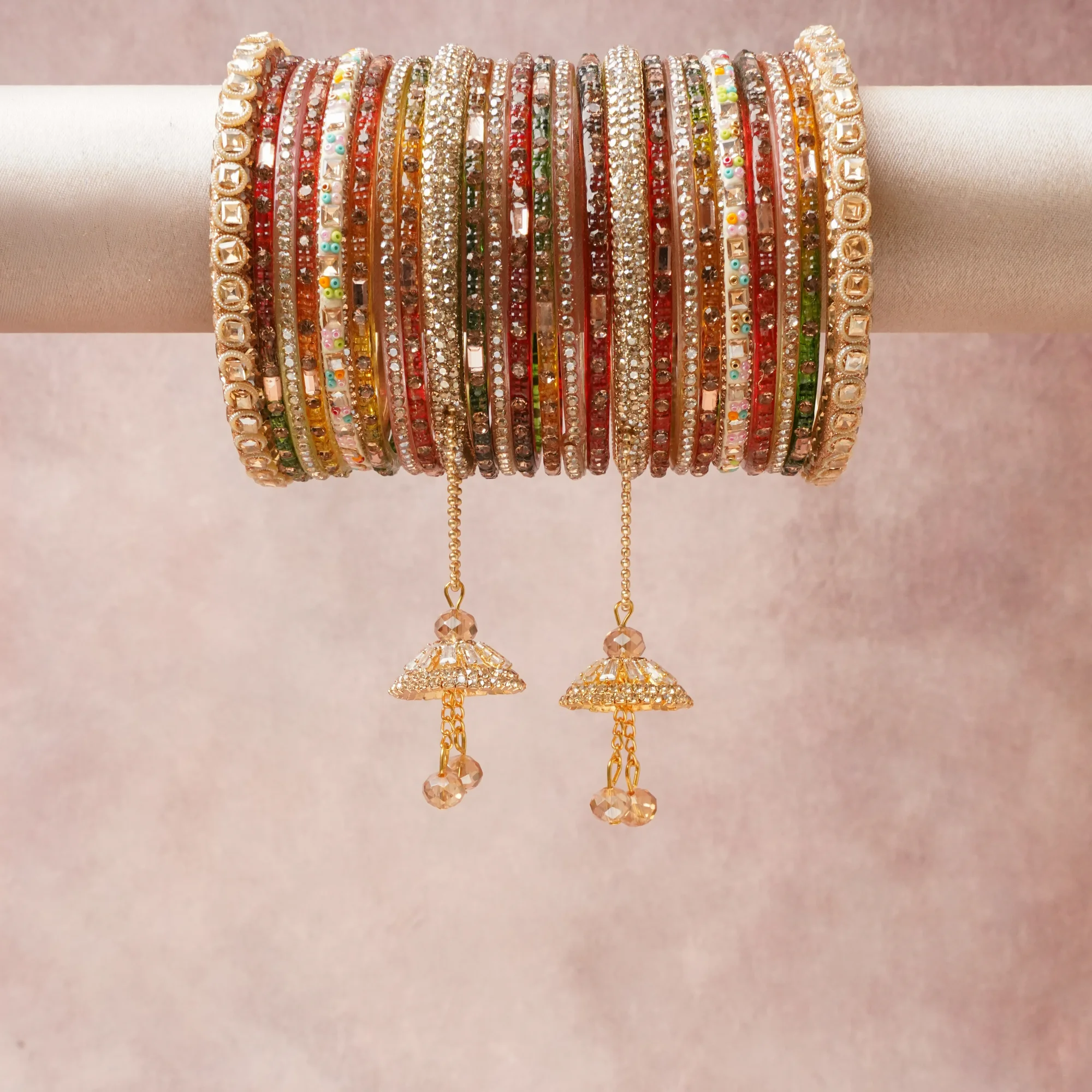 A commanding Multi colour anchors this beautiful set, enriched with accents of Champagne, Gold that add depth and dimension.

Featuring a striking composition of kundan, crystal, metal, this set carries intricate craftsmanship and strong presence. Grand in form, it is created for moments that deserve to be marked.
