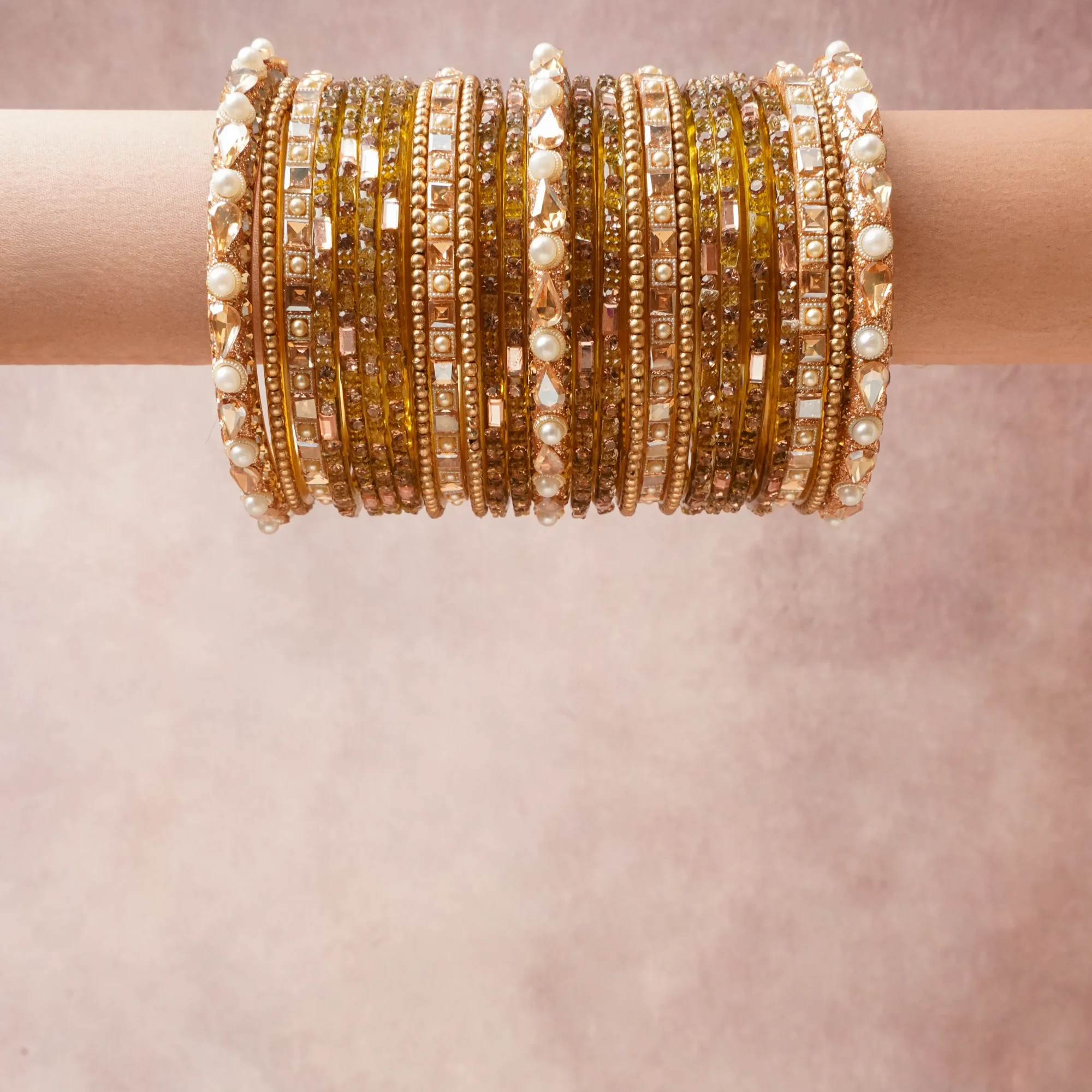 A commanding Gold anchors this beautiful set, enriched with accents of Champagne, Ivory that add depth and dimension.

Featuring a striking composition of metal, rhinestone, pearl, this set carries intricate craftsmanship and strong presence. Grand in form, it is created for moments that deserve to be marked.
