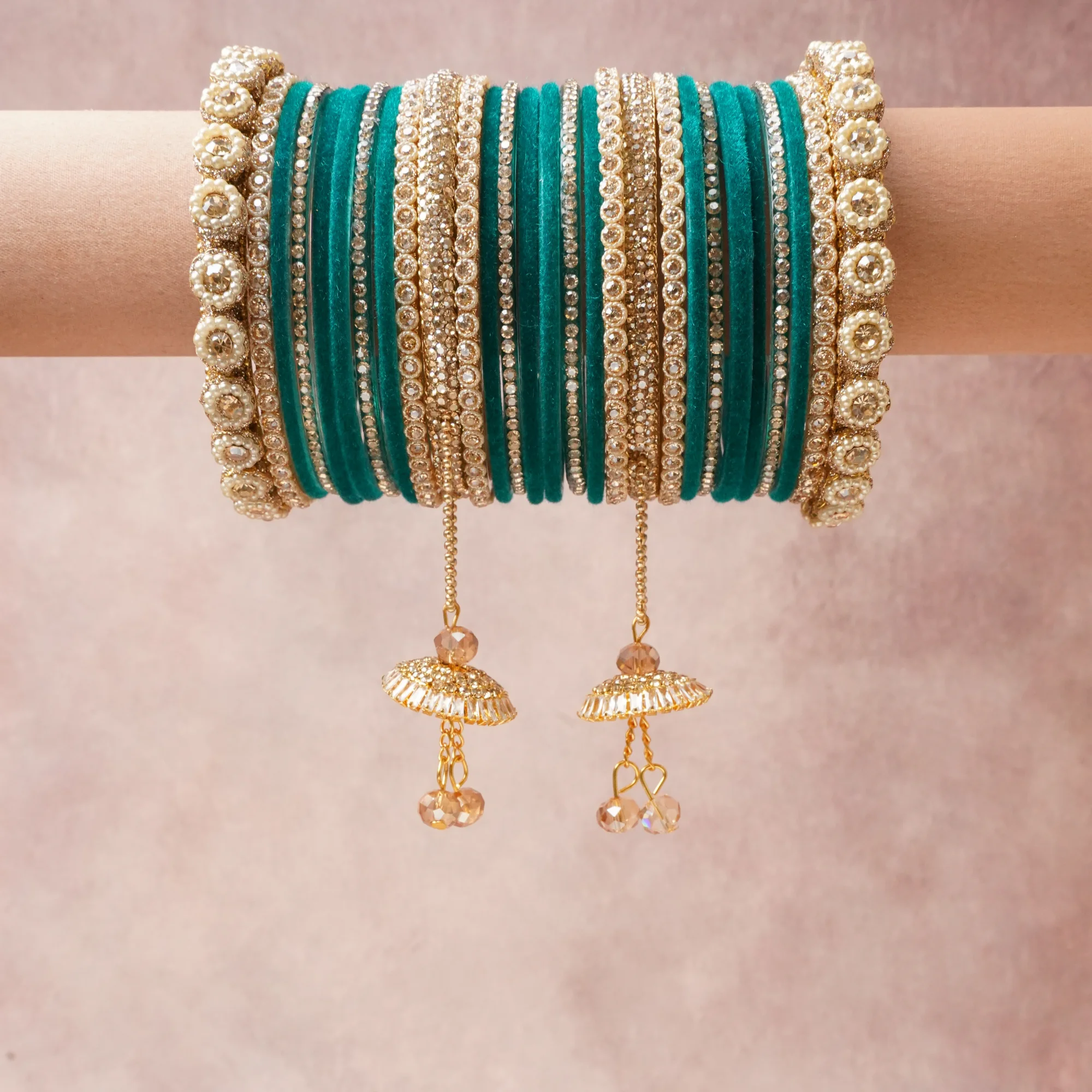 A commanding Teal anchors this beautiful set, enriched with accents of Clear Crystal, Gold, Champagne that add depth and dimension.

Featuring a striking composition of velvet, gold-tone metal,, crystal beads, this set carries intricate craftsmanship and strong presence. Grand in form, it is created for moments that deserve to be marked.