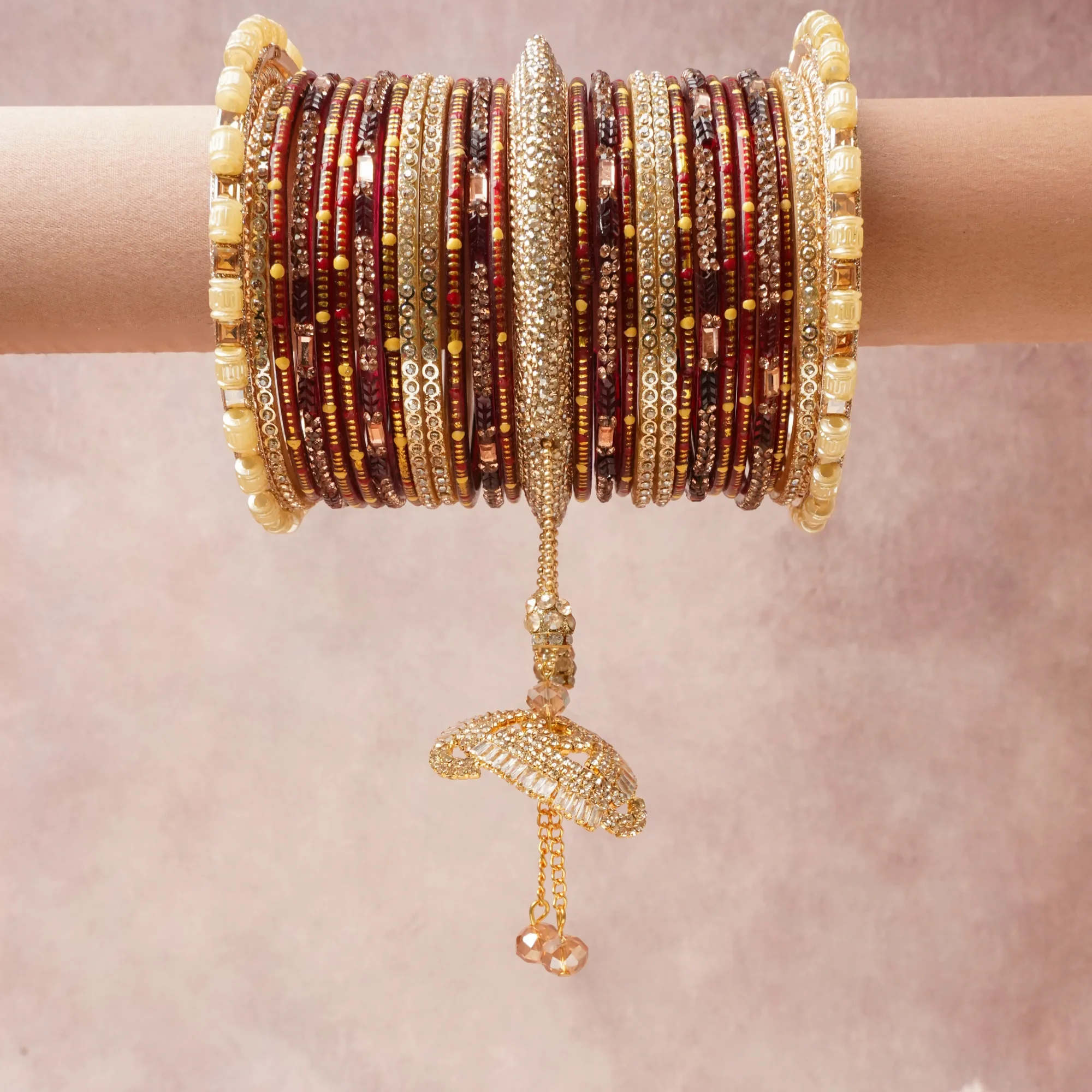 A commanding burgundy anchors this beautiful set, enriched with accents of gold, champagne that add depth and dimension.

Featuring a striking composition of glass beads, rhinestones, gold-toned metal, this set carries intricate craftsmanship and strong presence. Grand in form, it is created for moments that deserve to be marked.