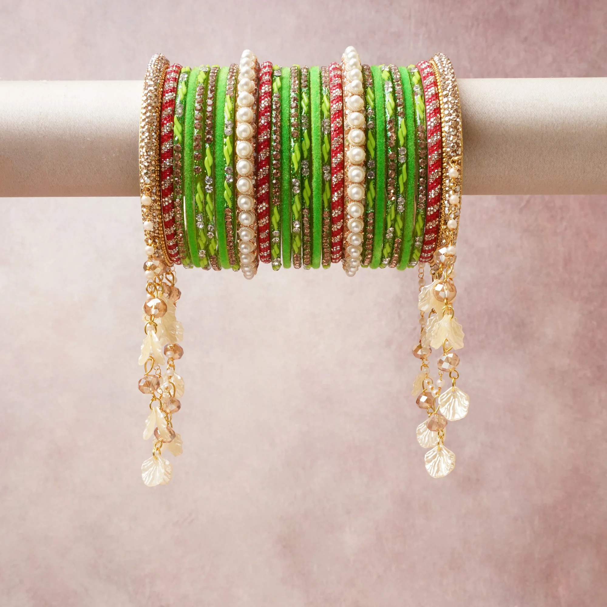 A commanding lime green anchors this beautiful set, enriched with accents of red, gold, ivory that add depth and dimension.

Featuring a striking composition of glass beads, faux pearls, gold-tone metal, this set carries intricate craftsmanship and strong presence. Grand in form, it is created for moments that deserve to be marked.