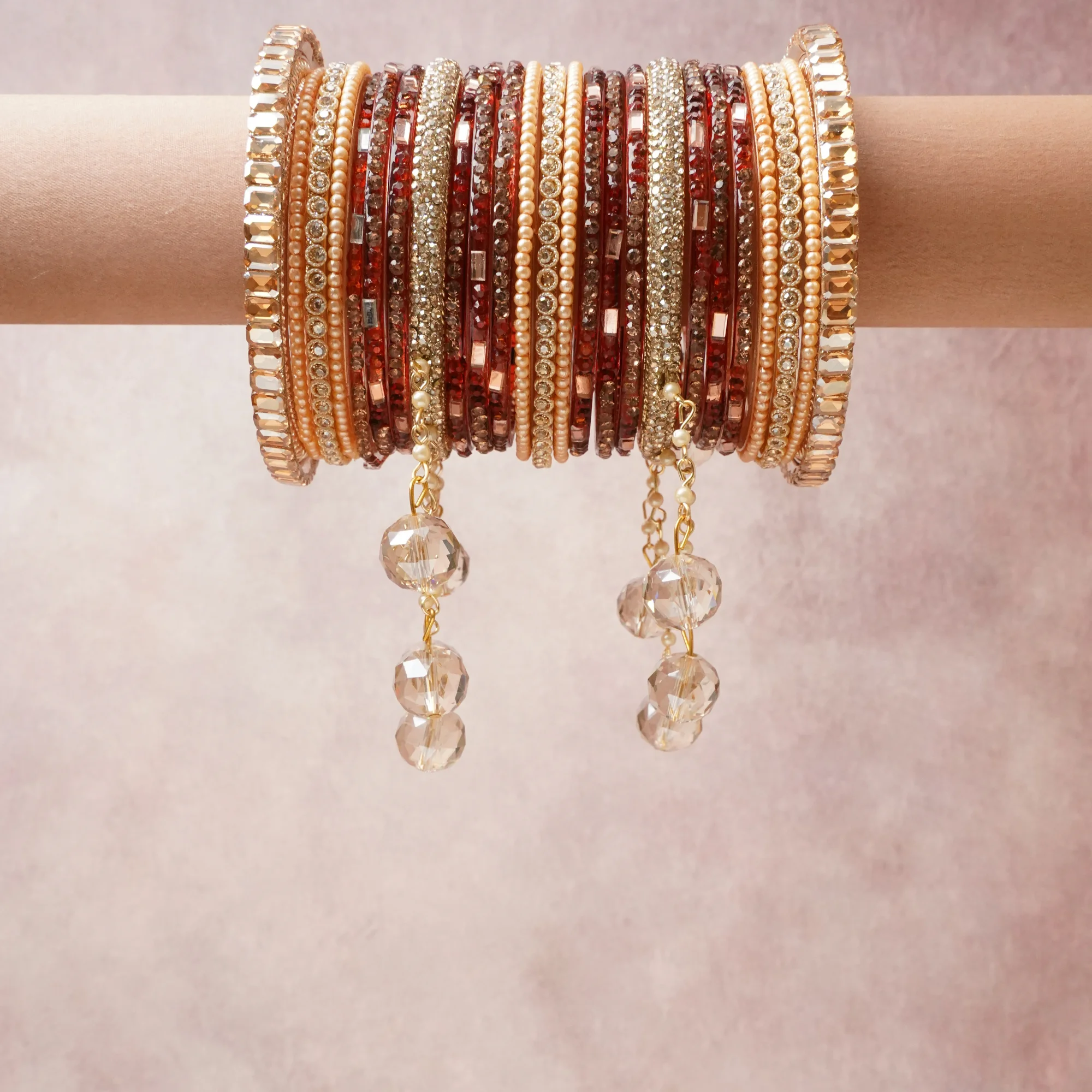 A commanding rose gold anchors this beautiful set, enriched with accents of ruby red, champagne gold, clear crystal that add depth and dimension.

Featuring a striking composition of metal, crystal beads, rhinestones, this set carries intricate craftsmanship and strong presence. Grand in form, it is created for moments that deserve to be marked.